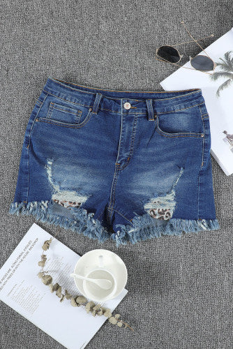 Mid-rise style denim shorts with trendy leopard print peek-a-boo pockets. The soft and lightweight stretchy fabric gives you a comfortable and perfect fit. Leopard print can vary on each pair. Material: 63%Cotton 35%Polyester 2%Spandex 