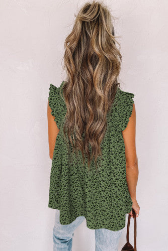 This beautiful floral babydoll is made with a cool cotton blend fabric. It features small black flowers on a green base. Finished with a square elasticized neckline and elasticized straps with ruffle trim. Perfect piece for summer! Roomy and flowy top. 